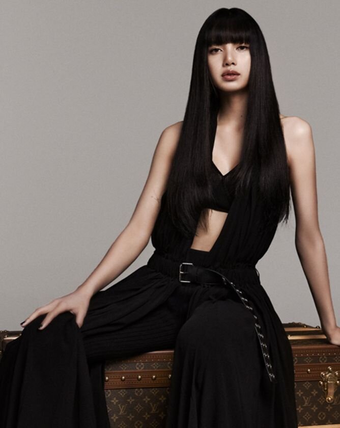 Lisa in a black Louis Vuitton look